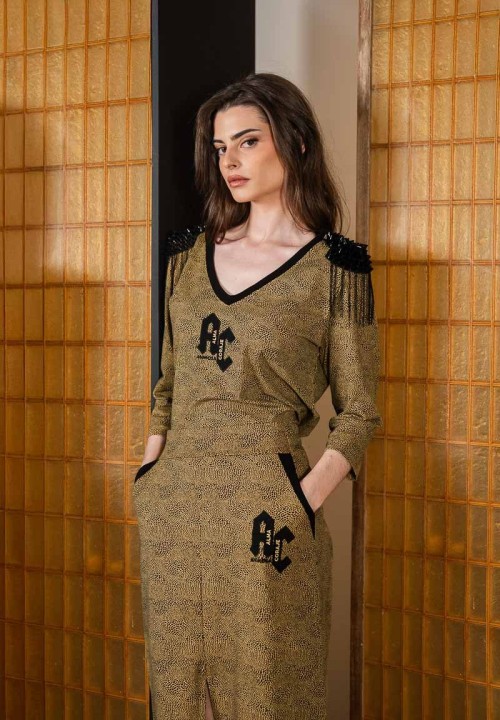 Camiseta animal print con hombreras y las letras AC | Animosa