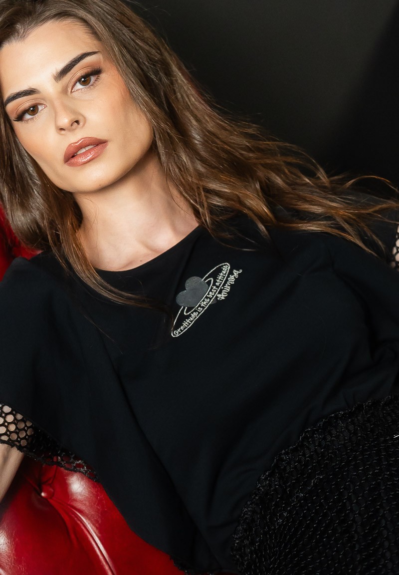 Camiseta con volantes de rejilla en las mangas | Animosa